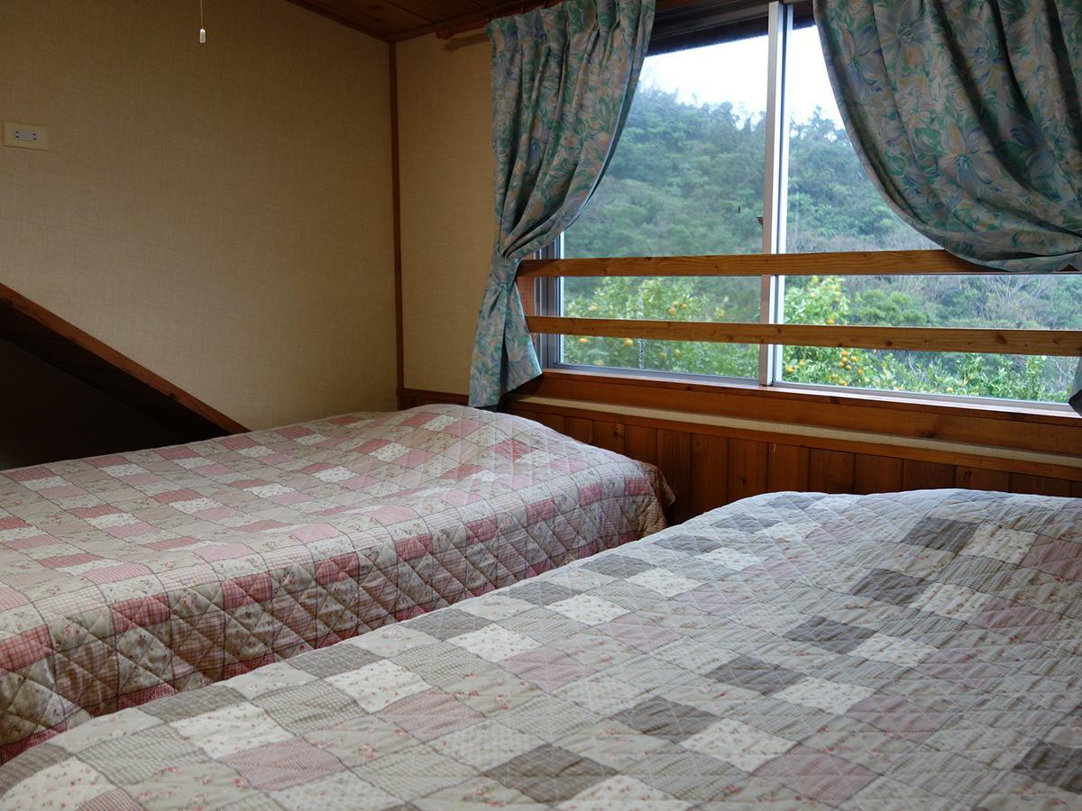 Log Pension Izumigamori Motobu Esterno foto